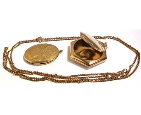 A 9ct gold locket/compact with heart clasp, an oval locket market 9ct BK-FT, a yellow metal link chain with central design se