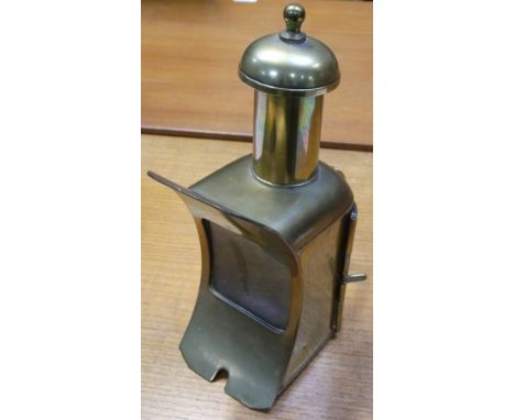 A brass compass lamp for gimballed fitting with convex main body and twin loop handles, height 25cm.