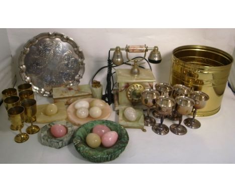 A quantity of onyx ware to include a telephone and decorative eggs, metalware to include a plated tray and cups and a brass b