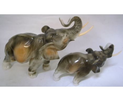 Two Royal Dux ceramic models of elephants, height of largest 23cm (2),