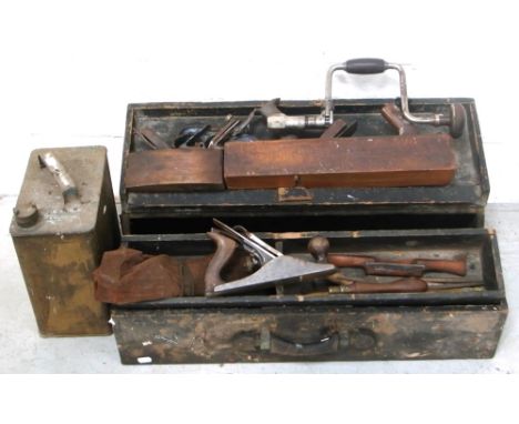 An early 20th century wooden tool box containing an assortment of hand tools and an early petrol canister. CONDITION REPORT I