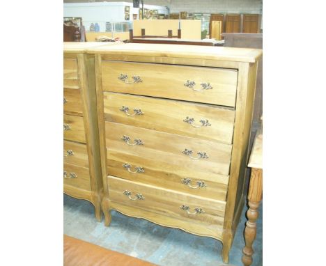 A Light oak French style chest of six drawers.