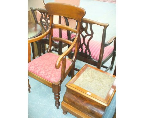 A Victorian mahogany commode stool and a Victorian mahogany elbow chair. (2)