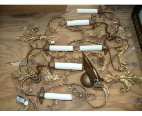 A Pair of gilt metal scrolling leaf 3 branch wall light fittings and a contemporary gilt composition ornament.(3) 