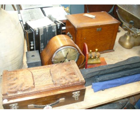 A Victorian oak stationary box, oak cased mantel clock, a single row Melodeon, box camera, hardwood folding book trough, stud