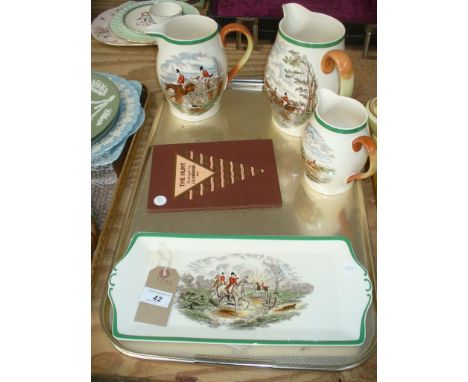 Three graduated Spode hunting jugs , a conforming sandwich plate and a booklet.