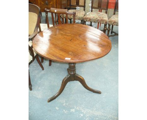 A Georgian country elm top tilt top tripod table.