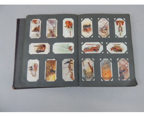 A quantity of cigarette cards, to include Players History of Naval Dress, Wills Garden Hints, etc.