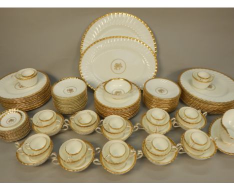 A Mintons Gold Rose pattern part tea, coffee and dinner service, decorated centrally with a flower in gilt, printed mark in p