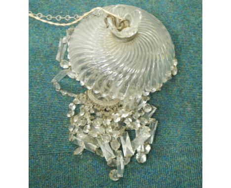 A moulded glass light fitting, of wrythen form, with suspended drops etc.