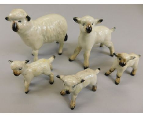 Five Beswick sheep, to include three Beswick lambs, model number 937 & 938 (2), each white gloss, a lamb, model number 936, 8