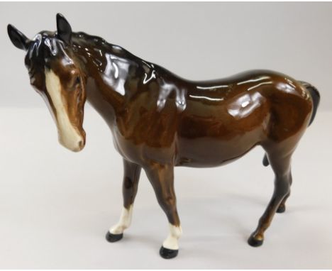 A Beswick model of a horse, with black Beswick circular stamp to underside, 20cm high