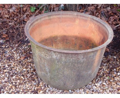 A late 19thC / early 20thC cast iron boiler, more commonly used as a planter, 72cm diameter.