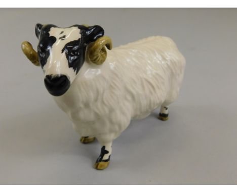 A Beswick black faced ram, model number 3071, black and white gloss, 8.3cm high