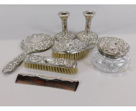 An Elizabeth II silver mounted dressing table set, to include two hand brushes, silver mounted comb, mirror, cut glass jar an