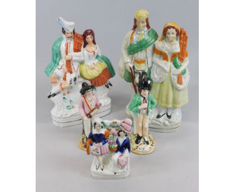Various Staffordshire figures, to include two flatback figure groups, and two similar figures, one depicting water and gin, e