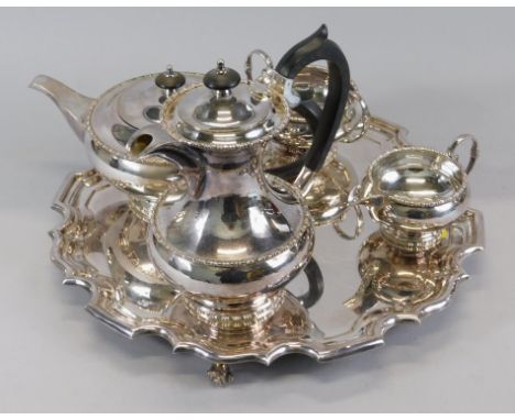 A silver plated four piece tea service, by Mappin & Webb, and a matching tray.