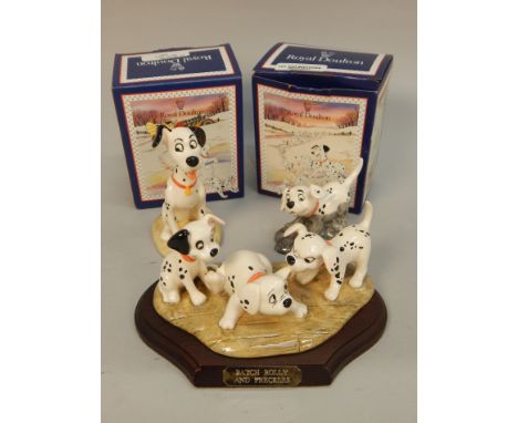 A Royal Doulton Disney's 101 Dalmatians figure, of Patch, Roly & Freckles, DN5, limited edition number 586/3500, on plinth, t