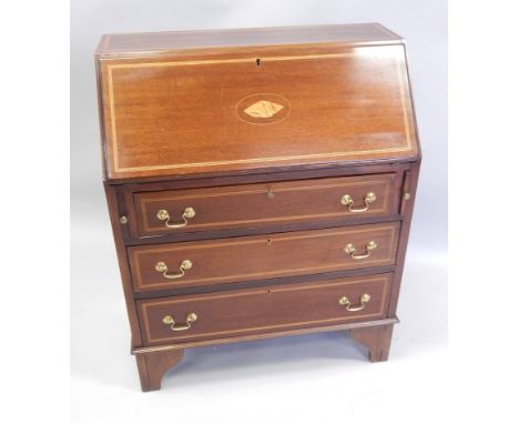 An Edwardian mahogany and marquetry bureau, with three drawers, on bracket feet, 75cm wide.