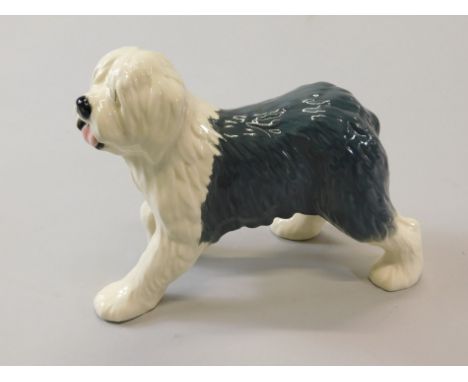 A modern Beswick Old English Sheep dog walking, 3058/D3058, gloss, with box, 16cm high