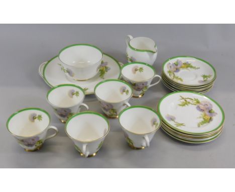 A Royal Doulton Glamis Thistle pattern part tea service, designed by P. Curnock, to include six cups and saucers.