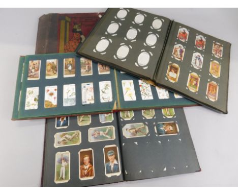 A collection of cigarette cards, mainly Players and Wills, to include Military Motors, Gems of Russian Architecture, Overseas