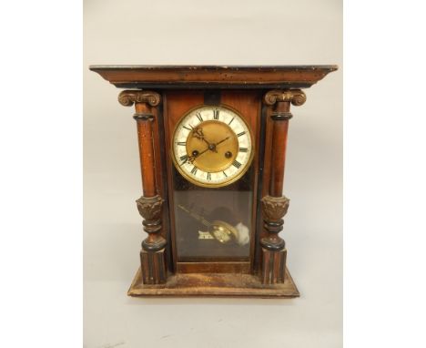 A late 19th/early 20thC small Vienna type wall clock, with enamel type dial, in a stained beech case, 42cm high