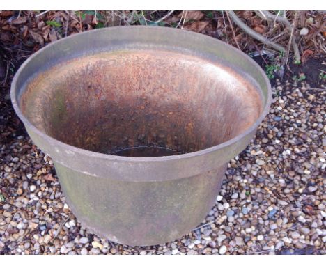 A late 19thC / early 20thC cast iron boiler, more commonly used as a planter, 74cm diameter
