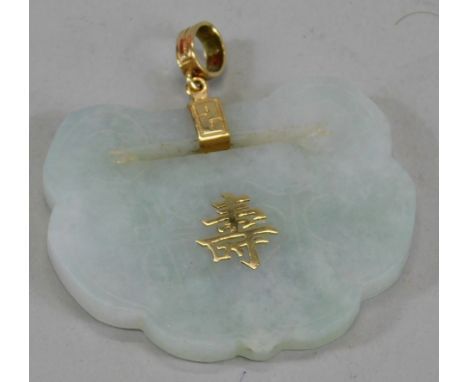 A modern jade pendant, with Chinese writing and yellow metal loop.