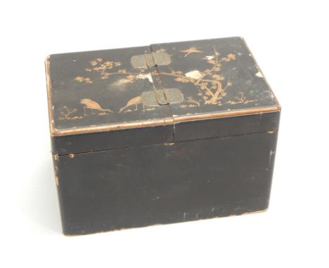 A late 19thC Japanese lacquer tea caddy, the hinged lid decorated in gilt with birds, flowers, etc, enclosing two compartment