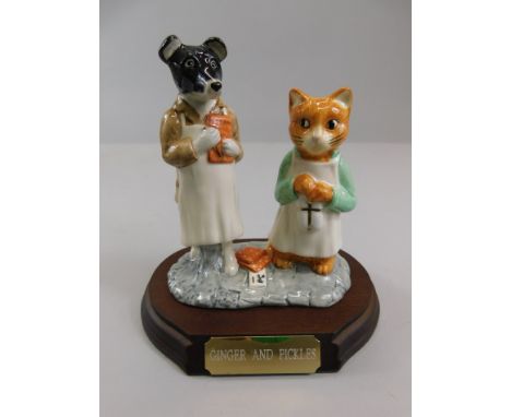 A Beswick ware Peter Rabbit & Friends limited edition figure, Ginger & Pickles, limited edition number 714/2750, on wooden pl