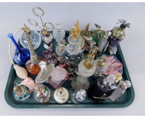 A large quantity of scent bottles, to include some with enamel type decoration, others in Art Deco style etc.