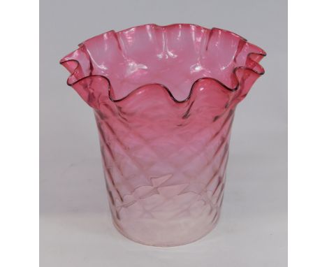 A cranberry tinted oil lamp shade, with a hatched design, 21cm high