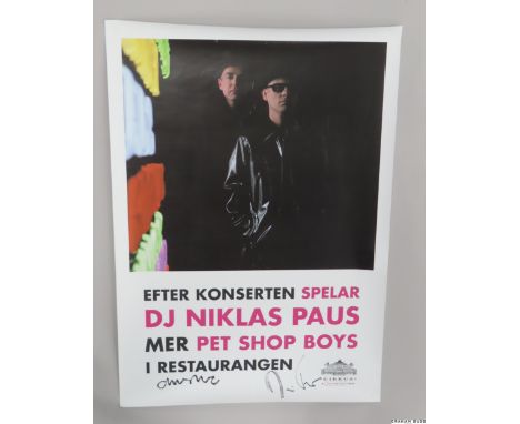 A large signed Pet Shop Boys colour promotional poster measuring 27.75 x 19.5in. and signed in black pen by both Neil Tennant