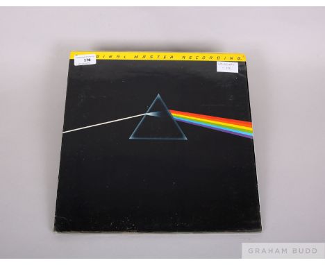 Pink Floyd Dark Side of the Moon original master recording  which is a white label copy featuring the Harvest Records logo an