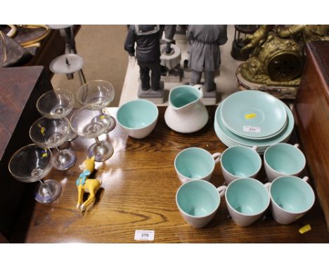 A quantity of Poole twin tone teaware; and five Babycham glasses 