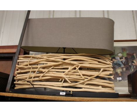 A driftwood lamp and shade 