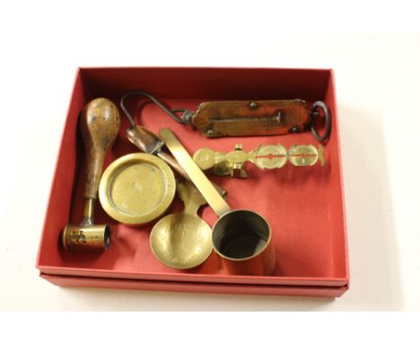 A wooden handled and brass shot measure; a set of sovereign scales; a set of pocket balance scales etc. 