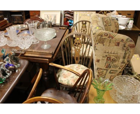 A set of six elm seated stick and wheel back chairs 