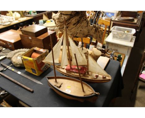 Two wooden model boats 