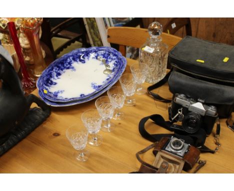 A glass decanter; together with a set of six glasses 