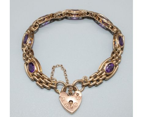 9ct yellow gold three bar gate bracelet set with amethyst, with heart padlock clasp and safety chain, stamped 375, 19.2g 