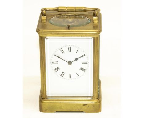 Early C20th French brass cased carriage clock, Gorge case with bevelled edged panels, twin train movement striking on a scrol