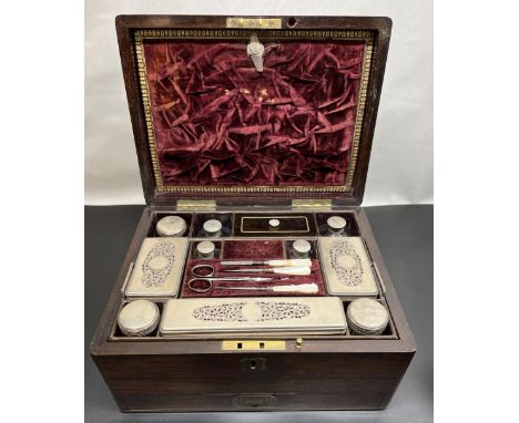 Victorian rosewood dressing case, fitted interior with mirror, lift out tray, ten EPNS topped glass jars and mother of pearl 