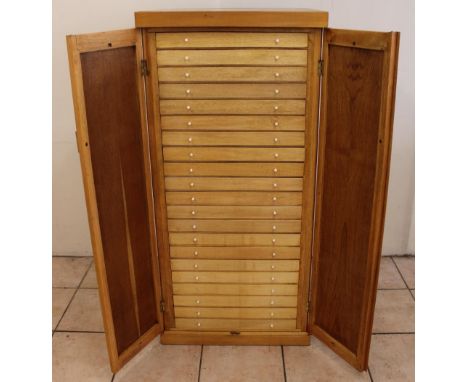 C20th light oak collectors specimen cabinet, twenty one glazed drawers containing a large collection of well presented native