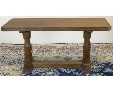 Robert "Mouseman" Thompson of Kilburn - an oak refectory style coffee table, adzed rectangular top on octagonal baluster supp