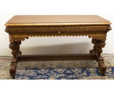 C20th light oak rectangular side table, gadrooned frieze drawer on twin lobed end supports and scroll feet with dolphin carve