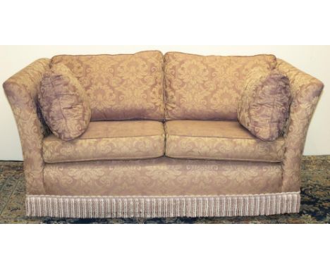 Country House style sofa, with low back and outswept arms, loose back and seat cushions, upholstered in pink damask, W157cm D