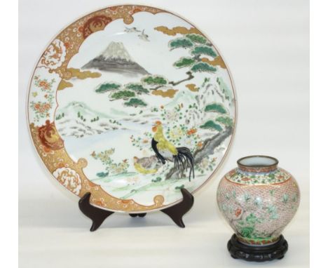 Canton circular charger, decorated with exotic birds in garden landscape with Mount Fuji, old exhibition label verso, D40cm (