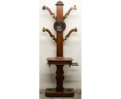 Victorian mahogany Country House style hall stand, four scrolling branches with cow horn hooks and circular mirror above hing